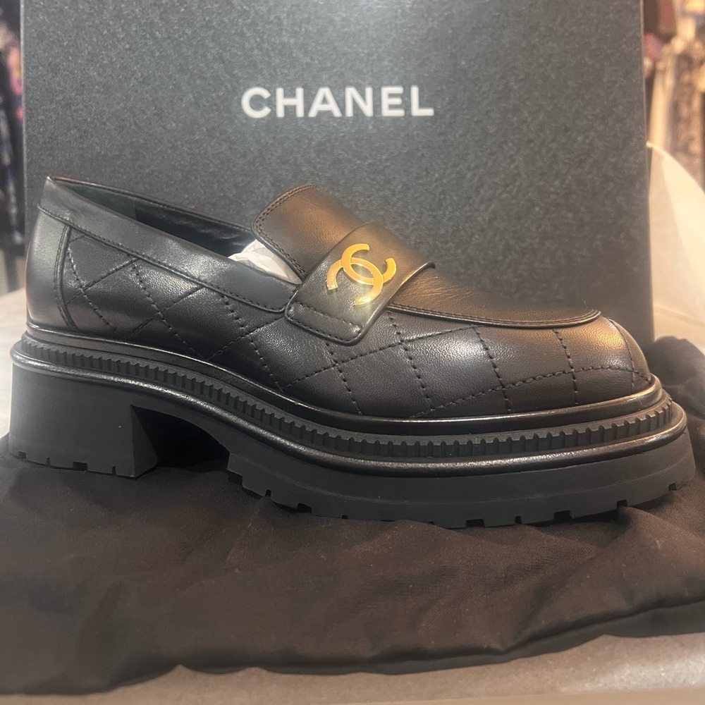 Chanel Moccasin 23A NIB Black Calfskin Quilted  CC Gold Logo Platform Loafers 37